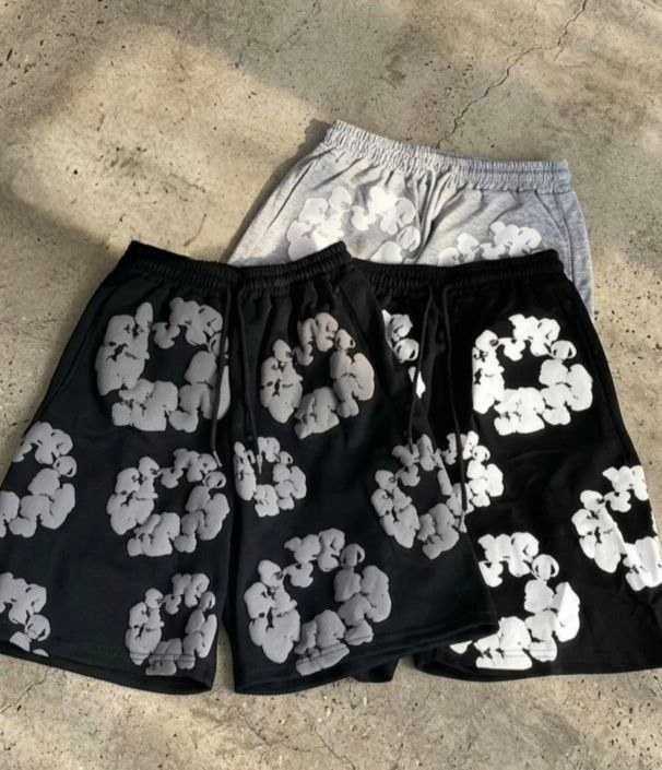 Short de jogging Denim Tears motif fleurs