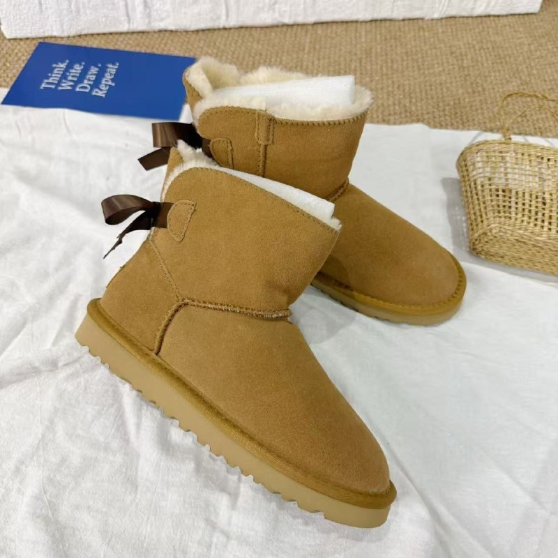 Bottes fourrées style UGG camel à nœuds