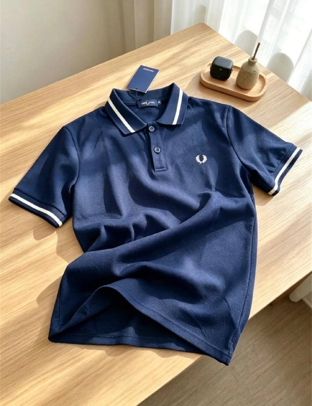 Polo Fred Perry bleu marine à liserés blancs