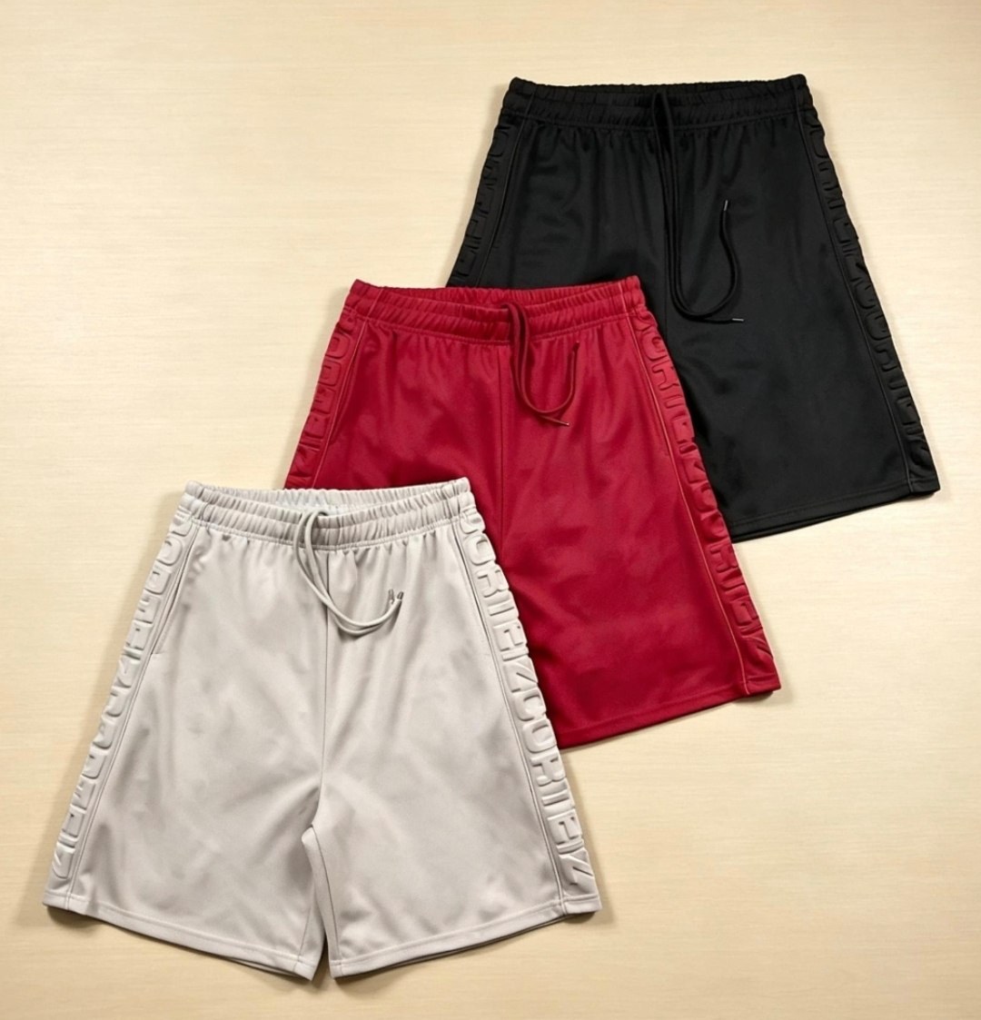 Shorts Corteiz bandes latérales à logo gaufré
