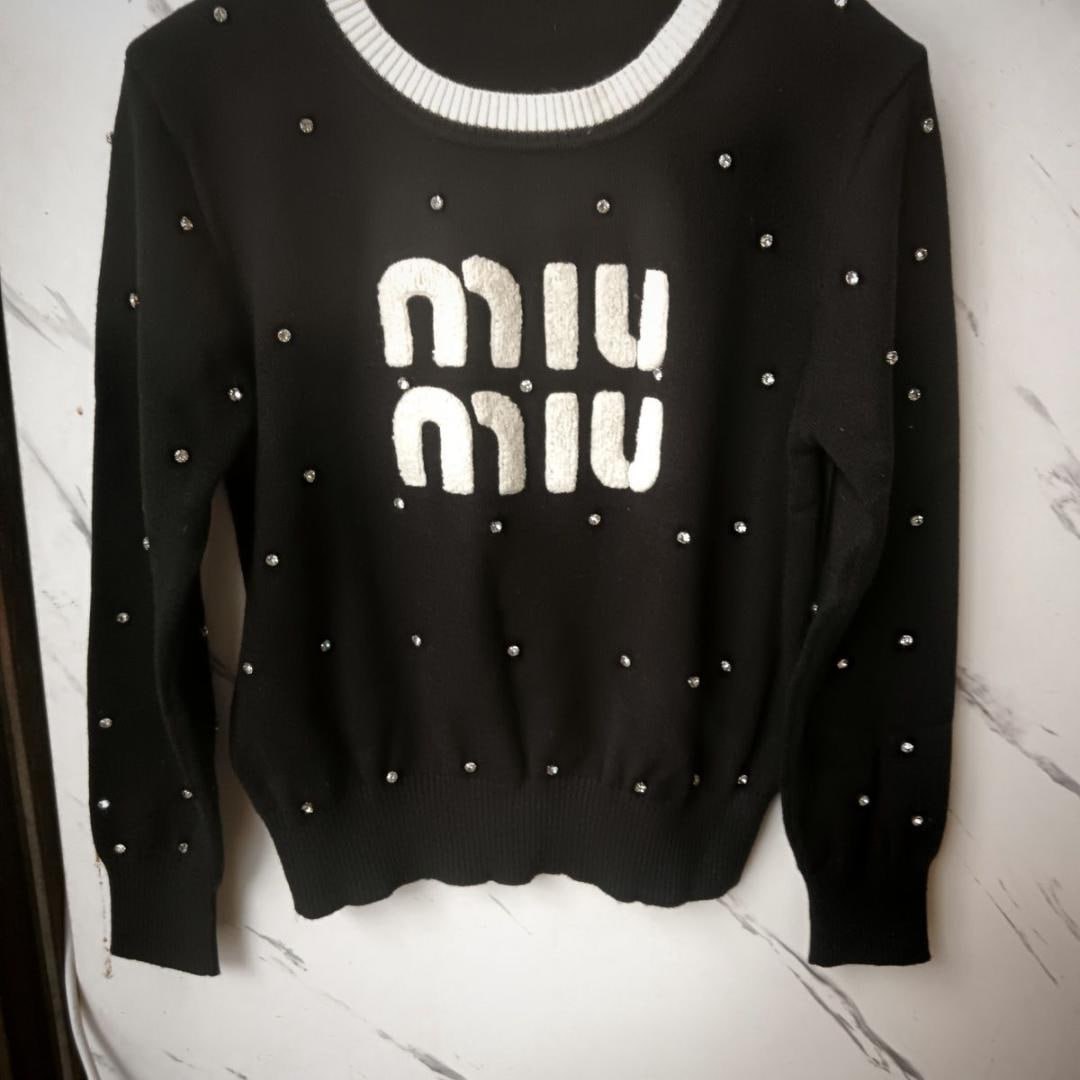 Pull en maille à strass Miu Miu