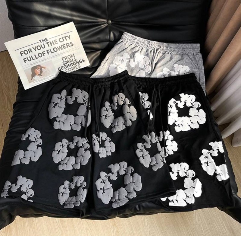 Short de jogging Denim Tears motif fleurs