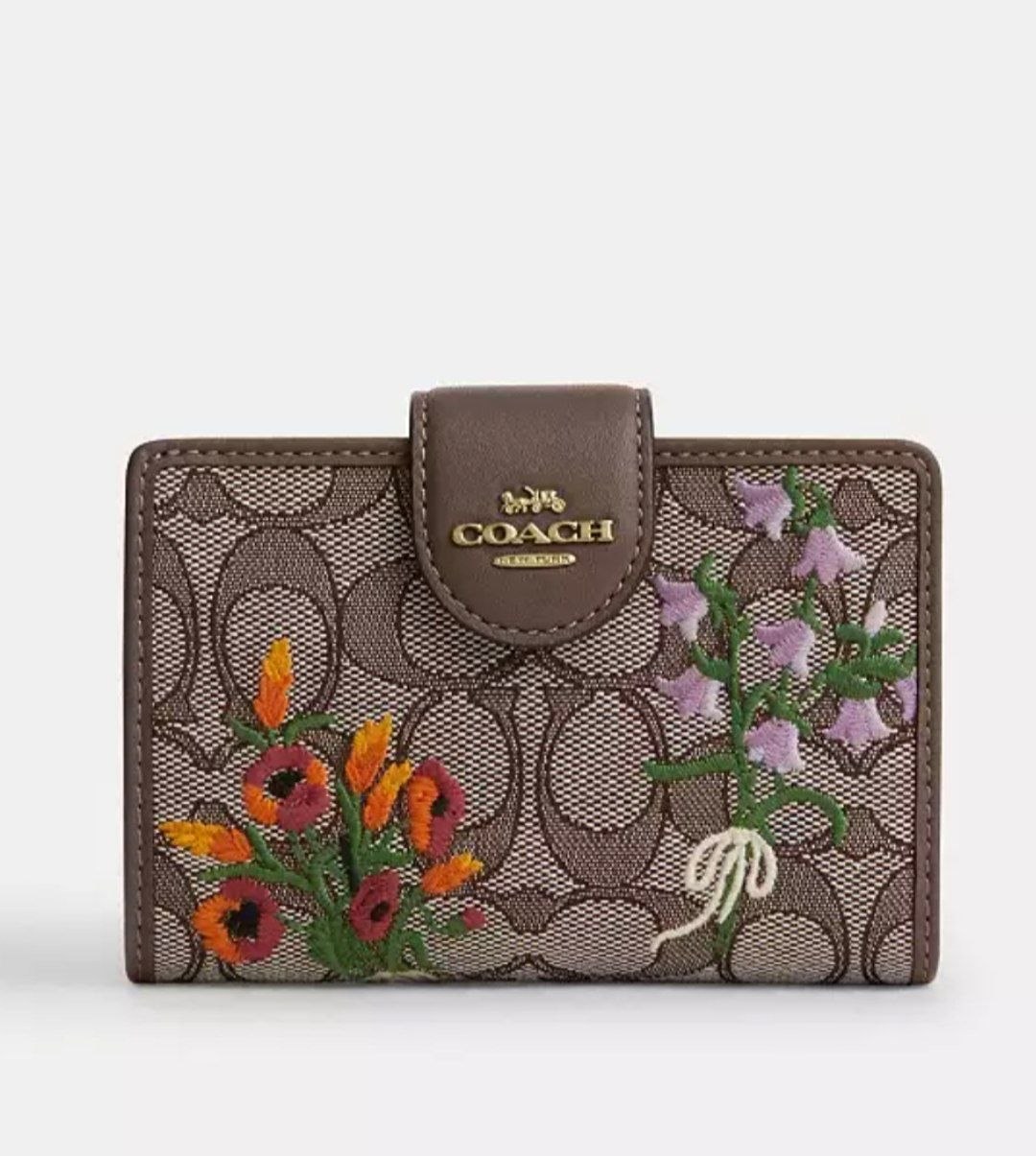 Portefeuille Coach en toile à motif floral
