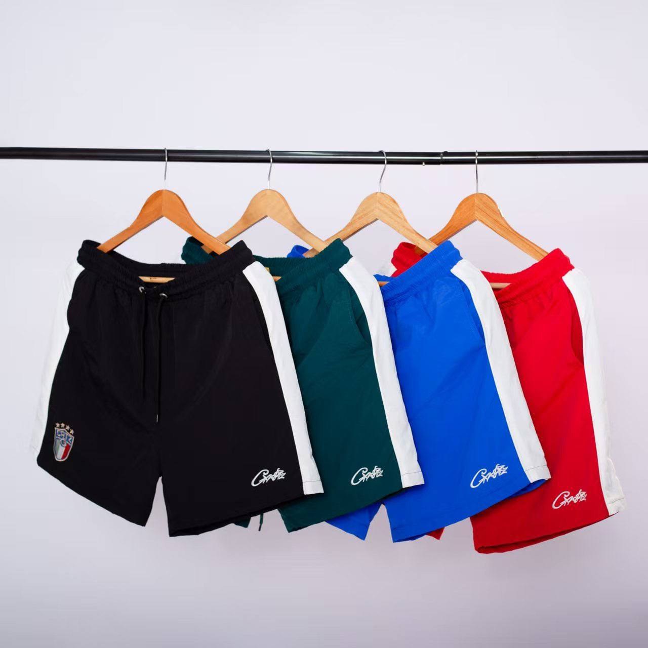 Shorts de sport bicolores Corteiz à bandes