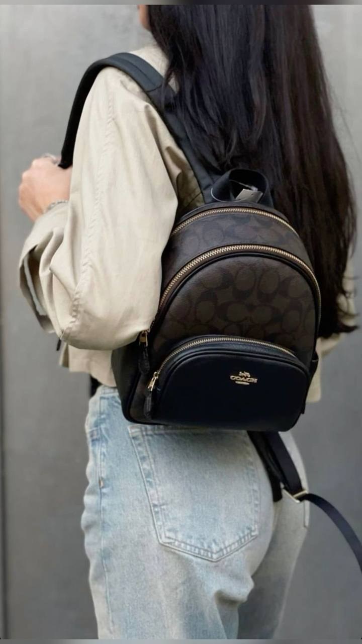 Sac à dos Coach en toile monogramme marron et cuir noir