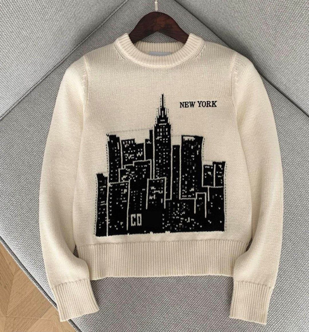 Pull Coach femme