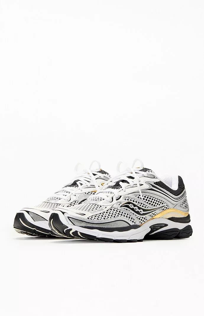 Baskets Saucony ProGrid Omni 9 blanc et or